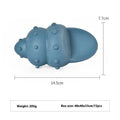 Deep sea shark shaped natural rubber dog chew toy in blue, next to conch and starfish shapes in green.