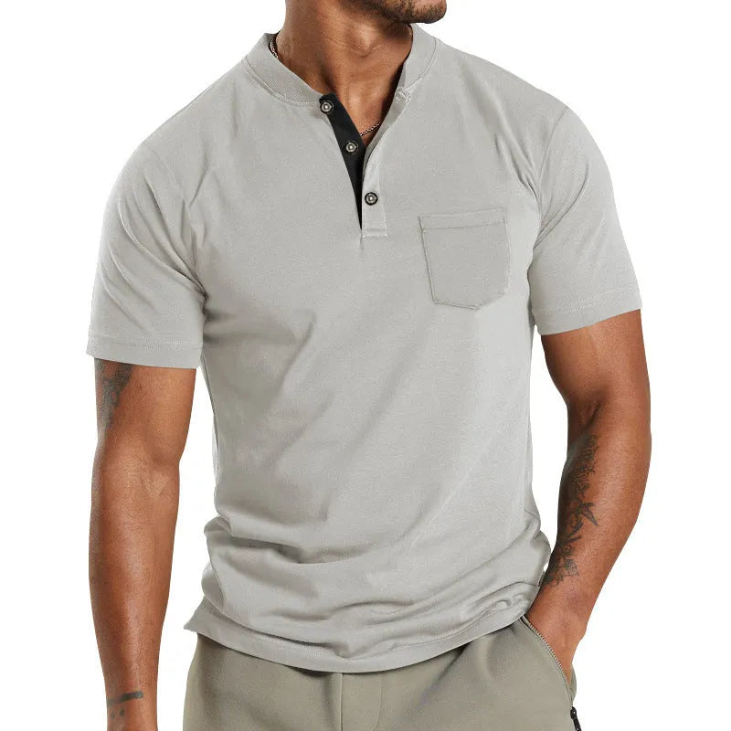 Plus size man wearing a light khaki short sleeve polyester shirt with a button chest pocket.