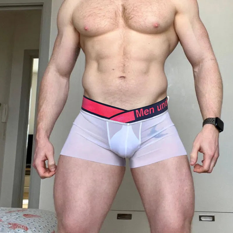 Men's low waist seamless underwear in black with a red gradient laser design pattern
