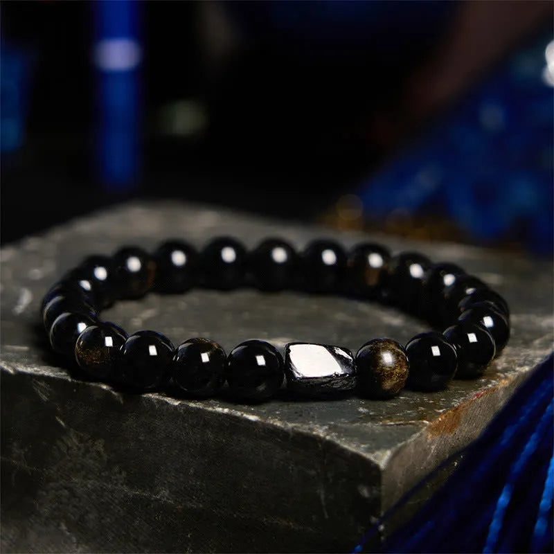 Natural obsidian single bead bracelet with 8mm diameter stone and retro constellation detailing on metal components