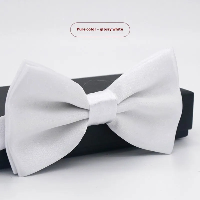Solid colour polyester bow tie with flat head design measuring 12cm by 6cm