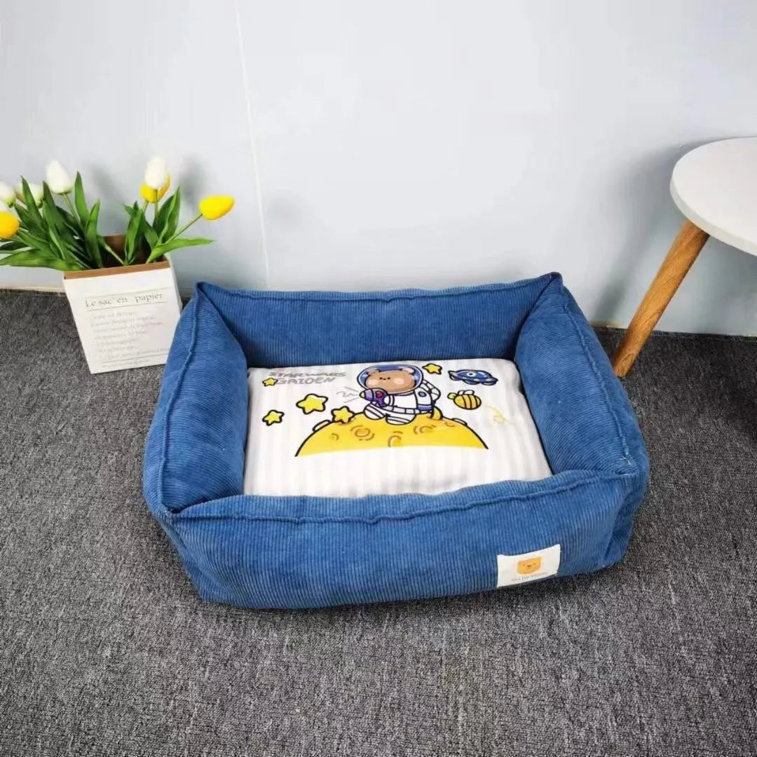 Light blue washable cotton pet winter nest for dogs and cats on a floor.