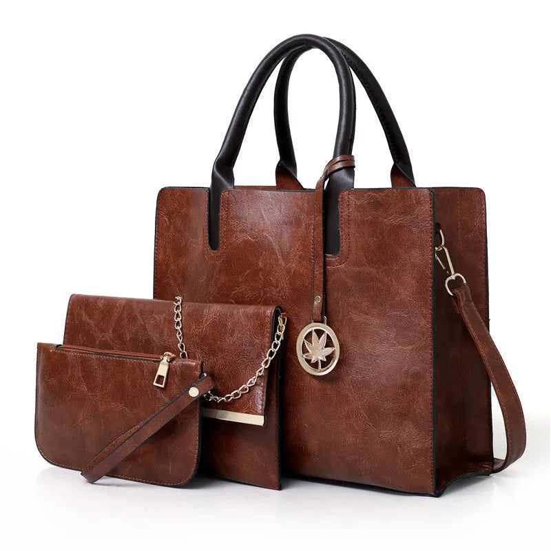 Women's PU leather mother-and-child shoulder bag set in red, black, pink, grey, and brown colours