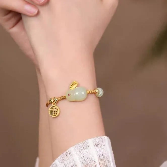 Hetian jade geometric rabbit charm bracelet on a yellow string for women