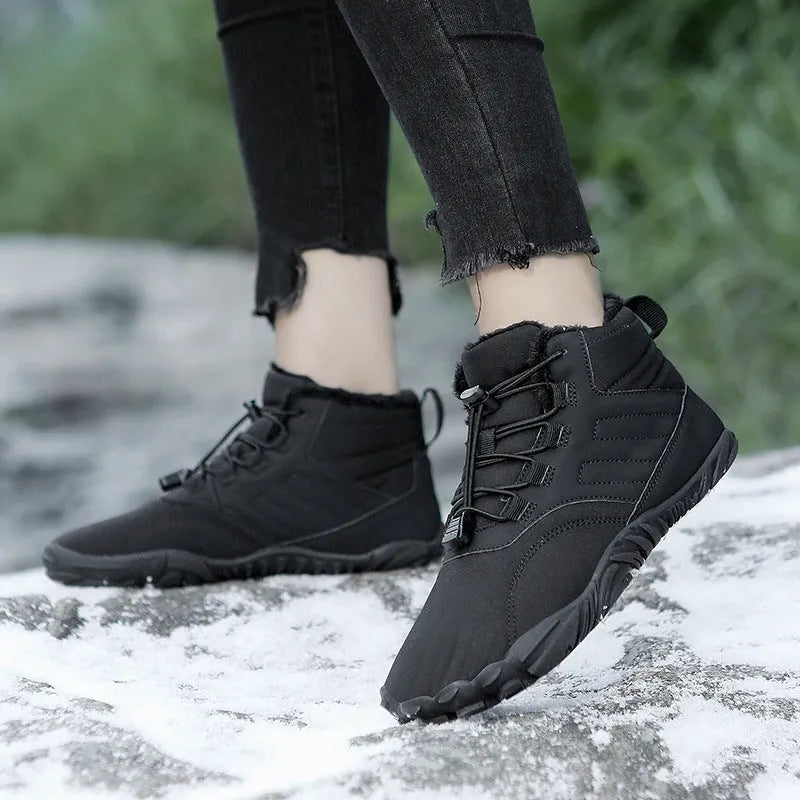 Outdoor winter slip-on boots for men and women with non-slip rubber sole, artificial plush lining, and waterproof Oxford cloth upper in black colour