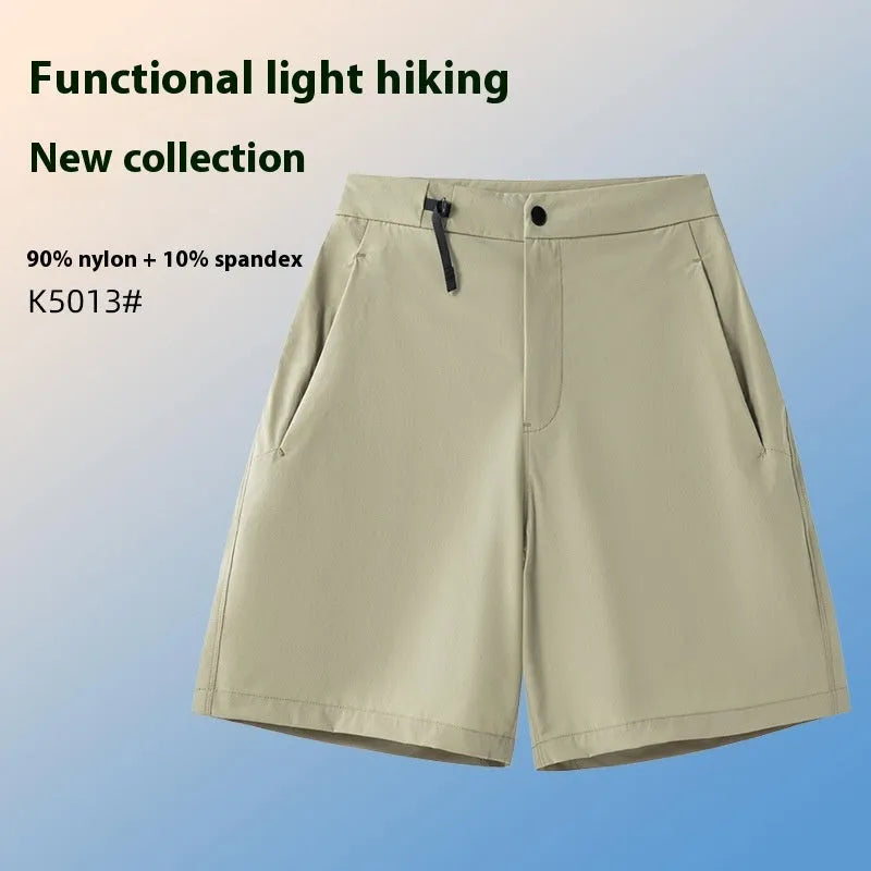 Men's solid colour quick-drying sports shorts with elastic construction, shown in khaki colour