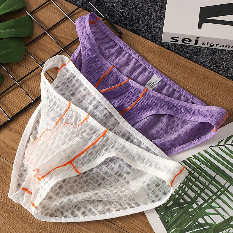 Men's low-waist lace briefs in ice silk fabric on a white background, shown in green colour.
