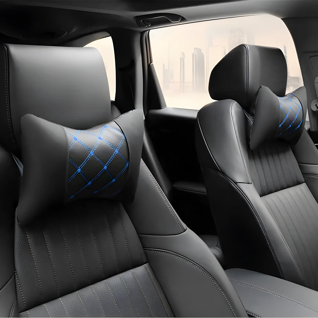 Black leather quilted car headrest neck pillow with diamond pattern and contrast stitching.