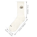 White cotton tube socks with printed Corgi dog pattern on a white background