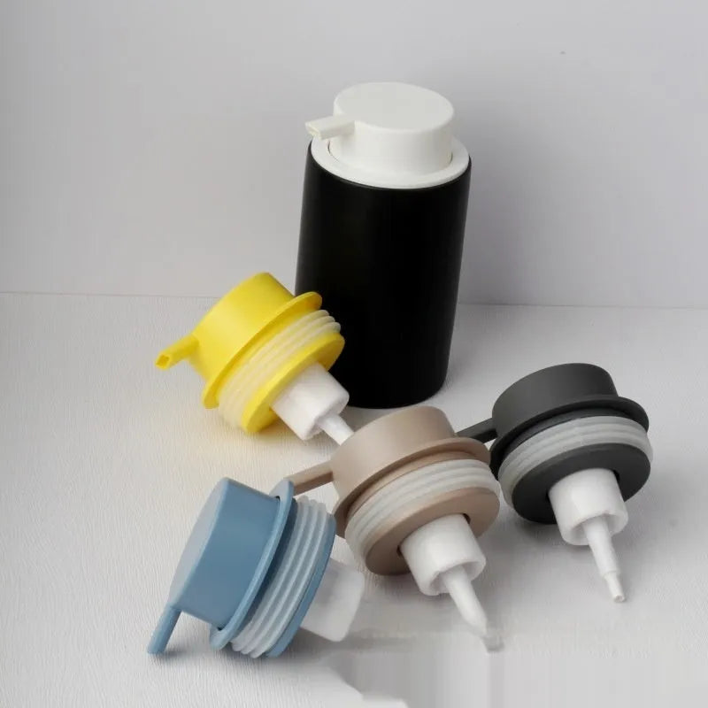 ABS plastic facial cleanser foam pump with large head in gold, silver, and black colour options.