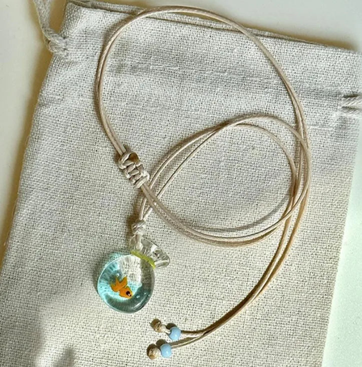 Women's coloured glaze skirt pendant necklace with joker design on cotton linen clavicle chain