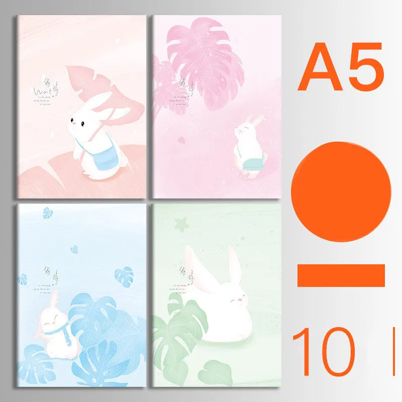 Bundle of ten soft-cover kraft paper notebooks with thread binding in various animal and nature designs.