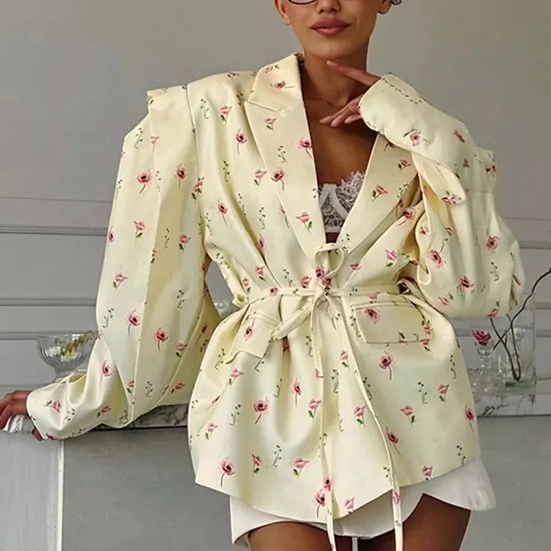 Womens lace-up collar suit jacket in a floral print with a cinched waist