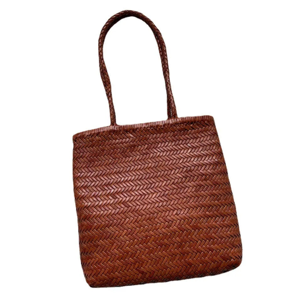Brown woven cowhide leather shoulder bag with three-dimensional outer pocket