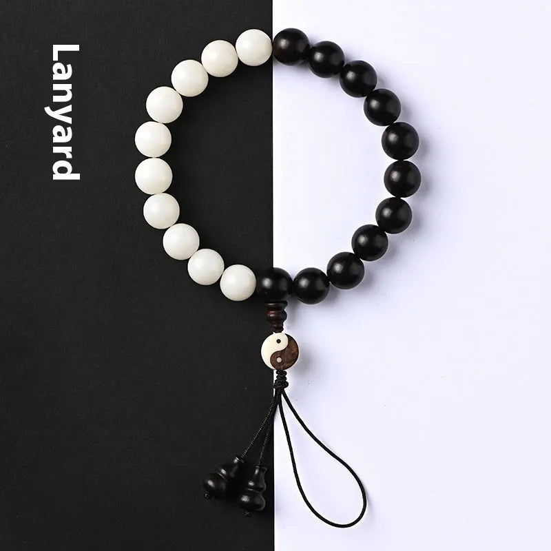 Handmade retro bracelet with eight-diagram pattern on 11mm White Corypha Umbraculifera and Blackwood Bodhi beads