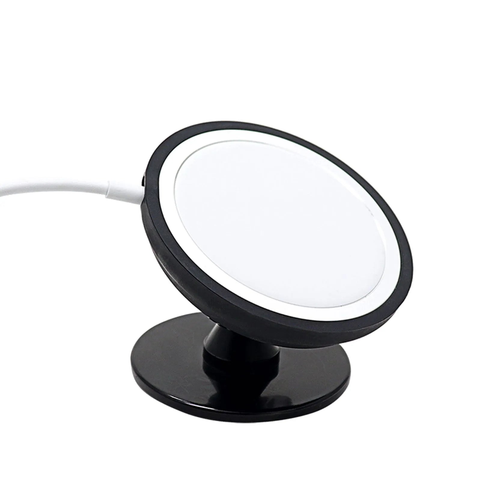 Black magnetic car phone holder mounted on vehicle air vent with smartphone attached