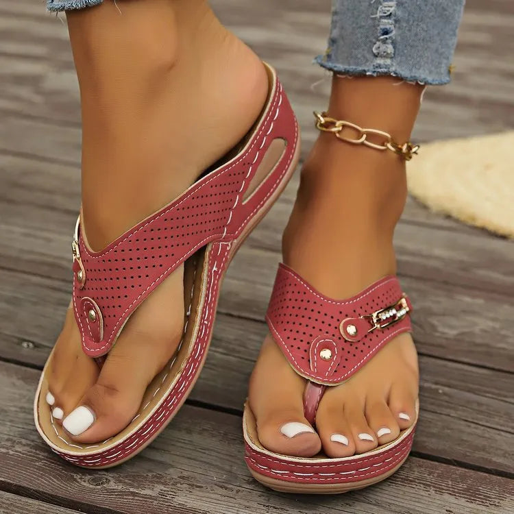 Women's retro flip-flop sandals in light brown colour showing PU upper material and herringbone scaffold design