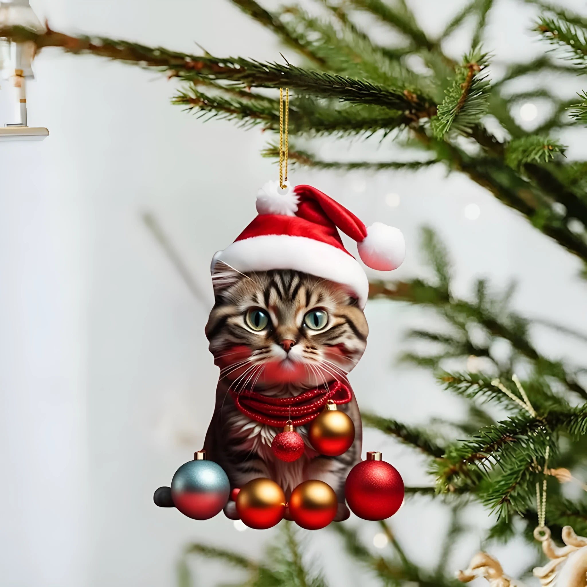 Colourful cartoon-style kitty cat Christmas ornament hanging, made from clear acrylic for car interiors.