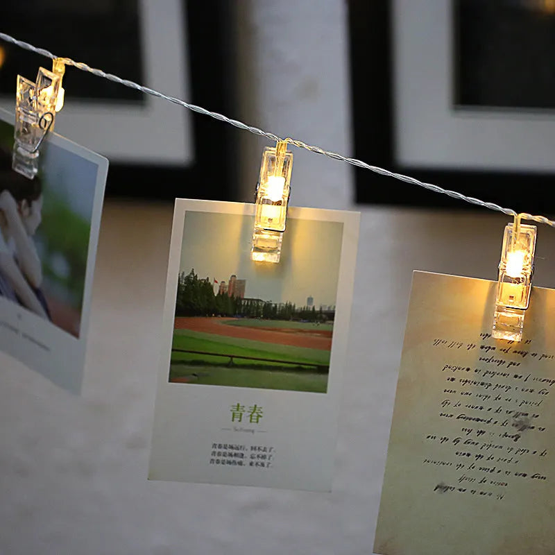 LED photo wall clip light string with heart-shaped clips, warm white lights, plastic construction, IP44 rated