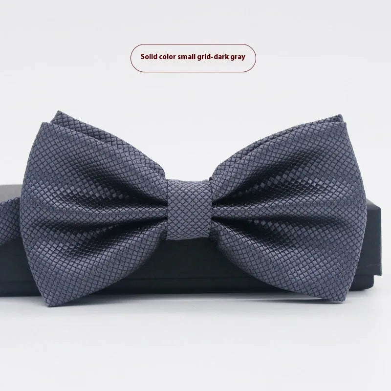 Solid colour polyester bow tie with flat head design measuring 12cm by 6cm