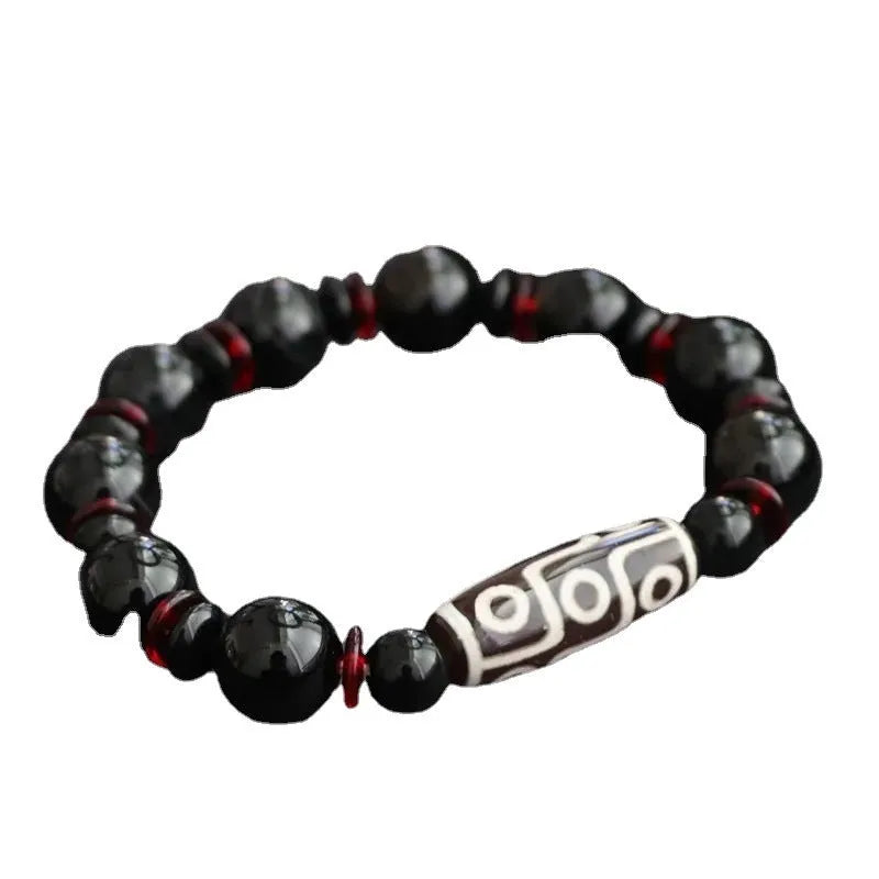 Black agate Dzi bead bracelet with hand-woven geometric pattern in national style design