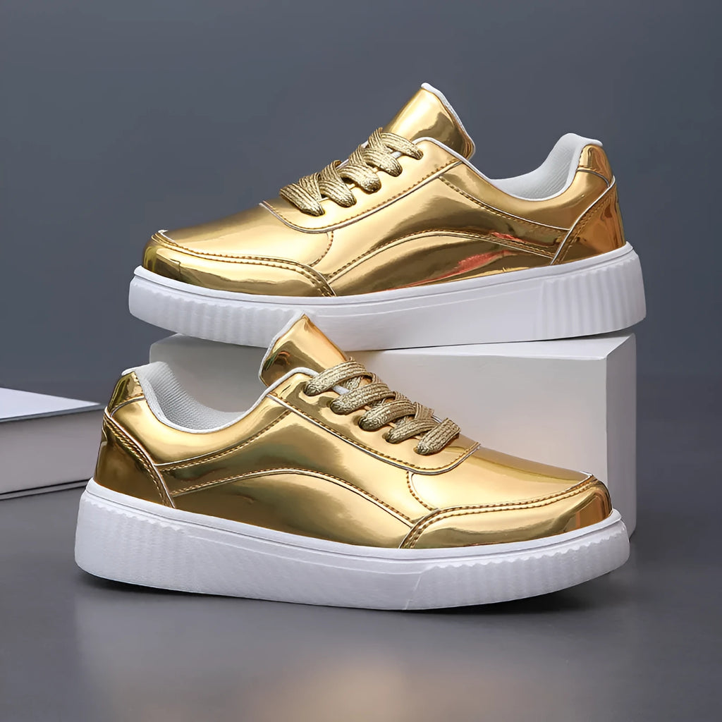 Thick-soled sequin sneakers in metallic rose gold with platform heel and round toe