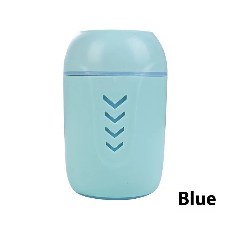 Compact round white portable air purifier with USB cable on a car dashboard and office desk.