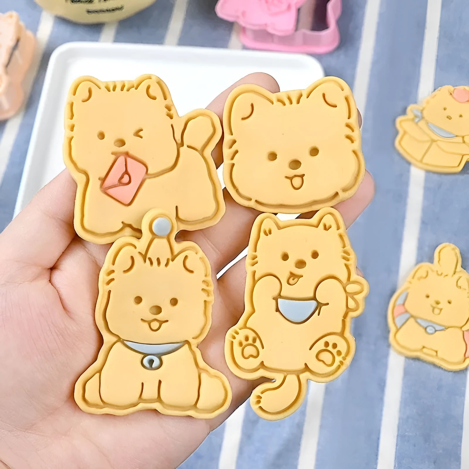 Three-dimensional plastic pet biscuit mould with cartoon puppy designs