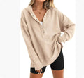 Women's loose raglan sleeve sweater in peacock green colour showing pullover design