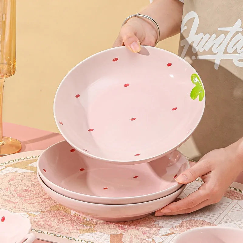 Strawberry pattern ceramic dinnerware set with flower bowls, straw hat plate, and twist spoon