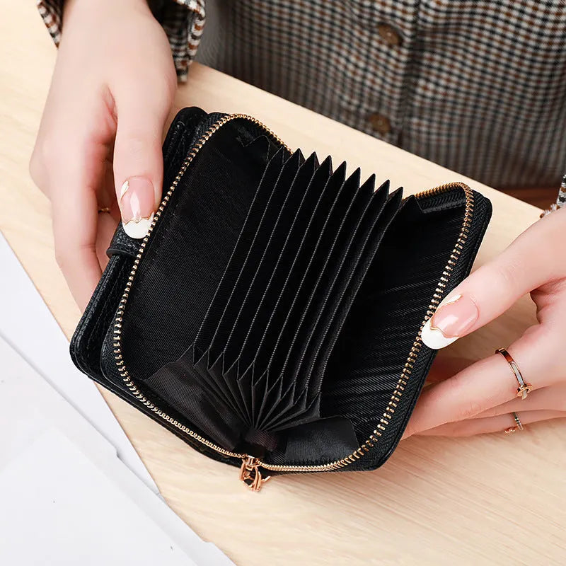Ladies' short PU leather wallet with lychee pattern, shown in bifold open view.