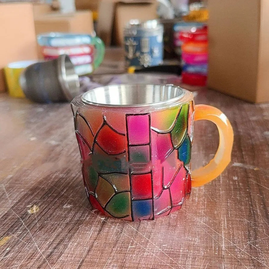 Painted synthetic resin coffee cup ornament for shelf display in Library or Pattern style.