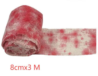 Roll of polyester Halloween horror bandage in bloody cloth red colour, 8cm wide
