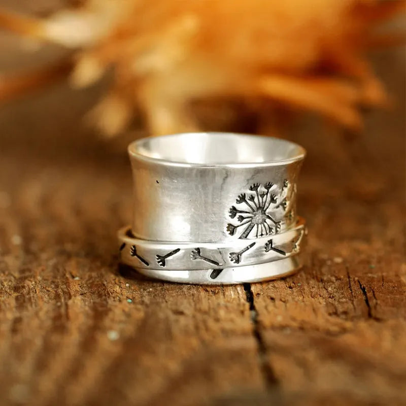 Silver electroplated rotatable flower ring showing adjustable design and flower shape