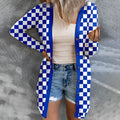 Women's long plaid cardigan coat in loose knitted construction with contrast colour pattern