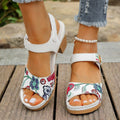 White women's high heel sandals with a visible Velcro strap buckle on a rubber sole.