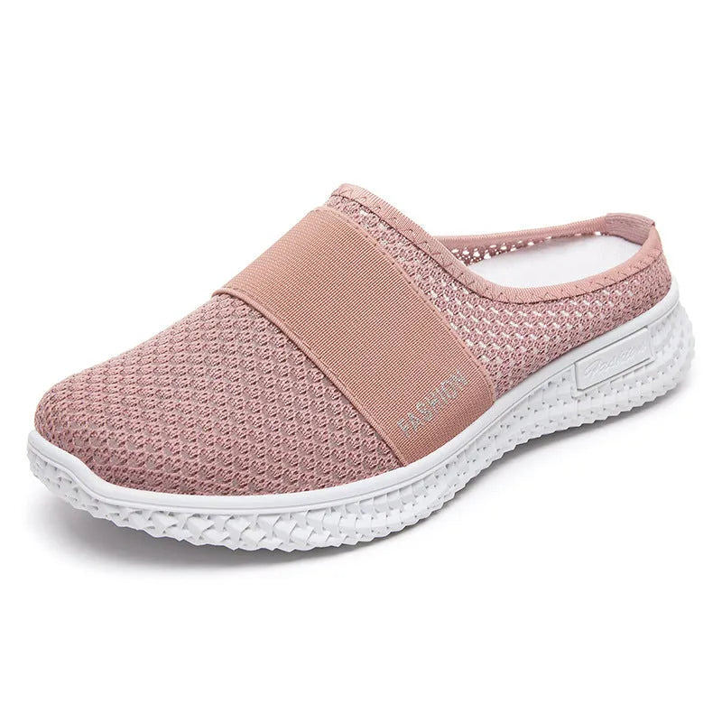 Women's black mesh casual flat shoe with round toe and hollow-out design on a neutral background.