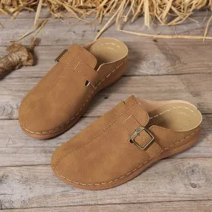 Women's casual wedge slipper in light brown with cloth upper and rubber sole