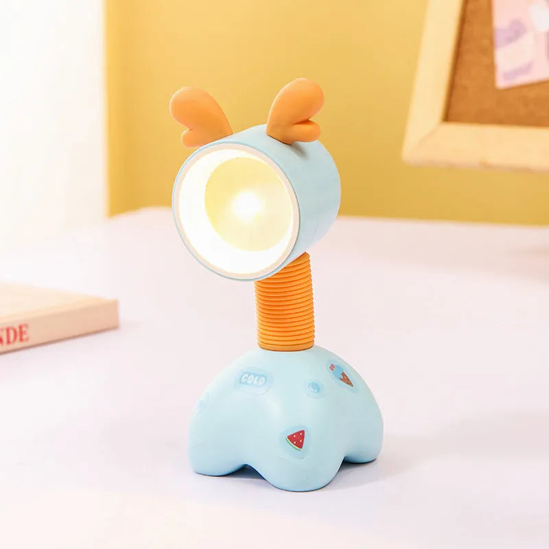 Cartoon animal magnetic night lamp with adjustable head on metallic surface