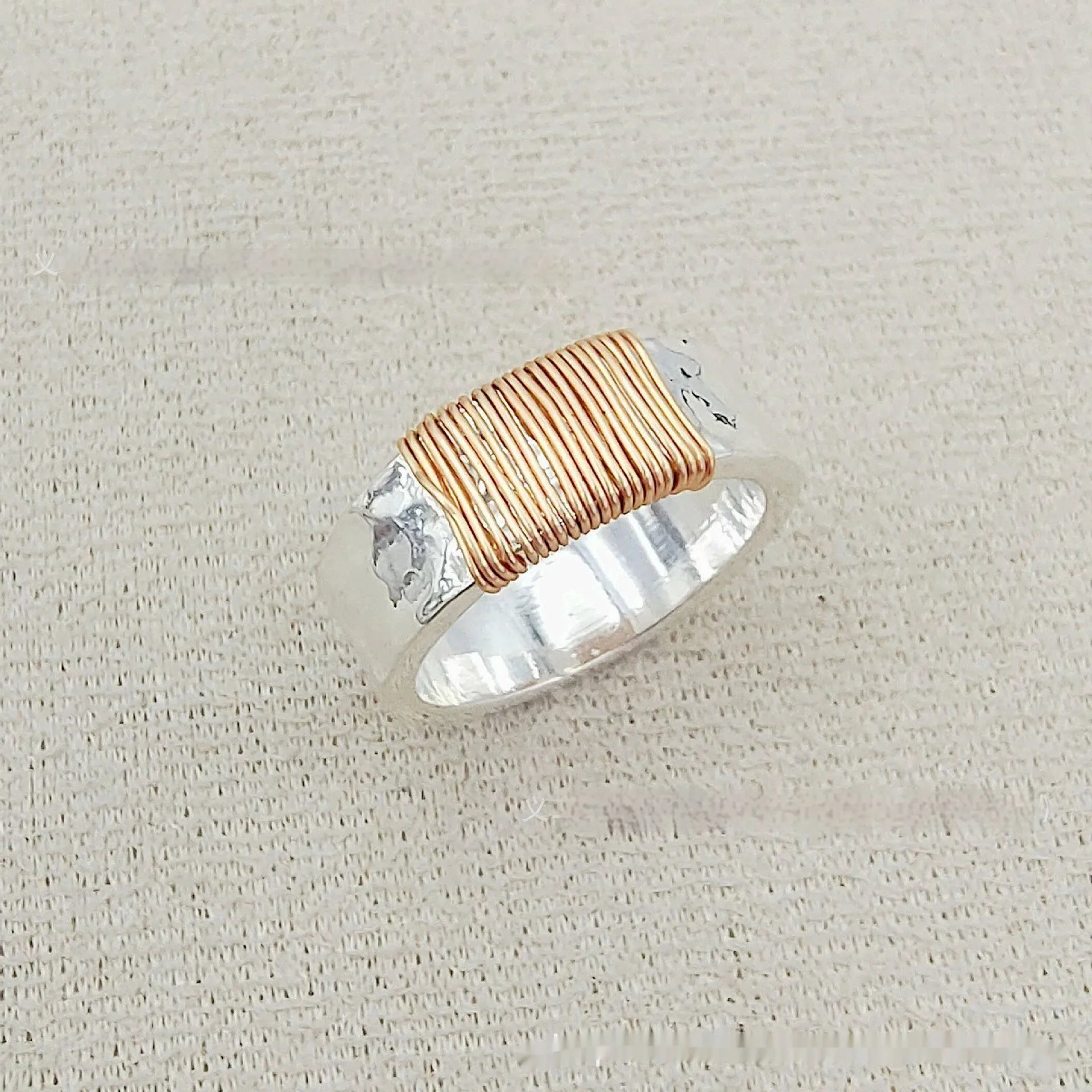 Geometric copper ring bracelet with irregular coil design in silver or gold electroplated finish