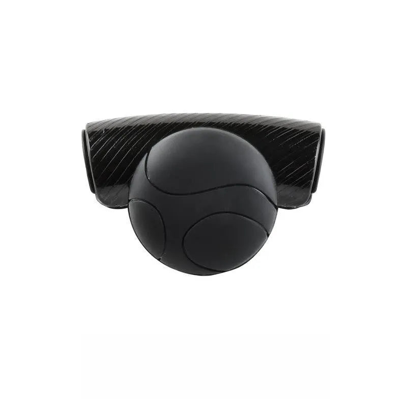 Black silicone steering wheel assist ball with metal bearing mounted on car steering wheel