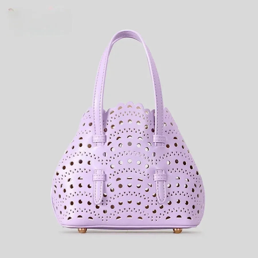 Hollow carved PU messenger bag with three shoulder straps in horizontal square shape