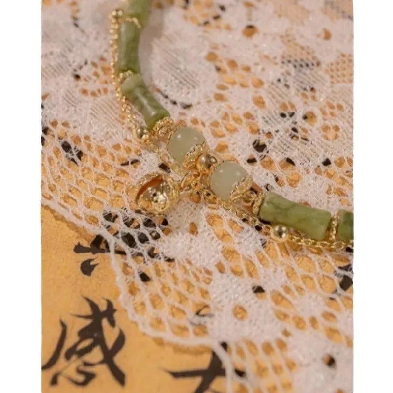 Women's Hetian jade bamboo bracelet on wrist, adjustable 15+3 cm, natural stone geometric design