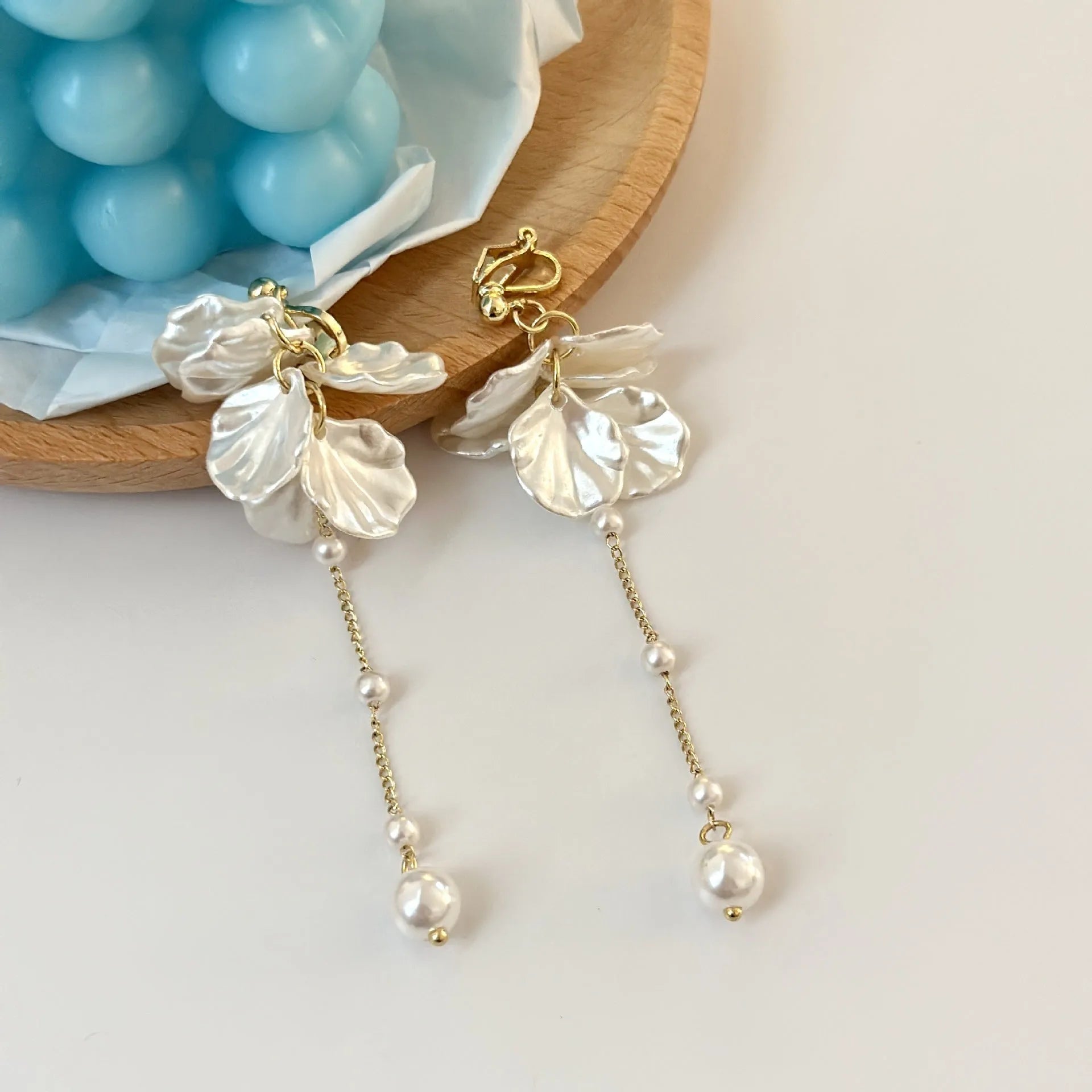 Women's fashion shell pearl tassel earrings showing 8.8cm length with multiple clip style options