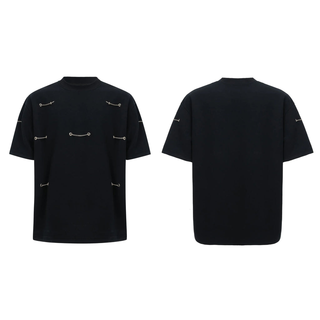 Black cotton blend T-shirt with metal chain detail on padded shoulders, short sleeves, round neck, front view