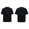 Black cotton blend T-shirt with metal chain detail on padded shoulders, short sleeves, round neck, front view