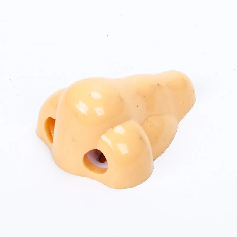 Flesh colour geometry-shaped plastic pencil sharpener with big nostril opening for manual pencil sharpening
