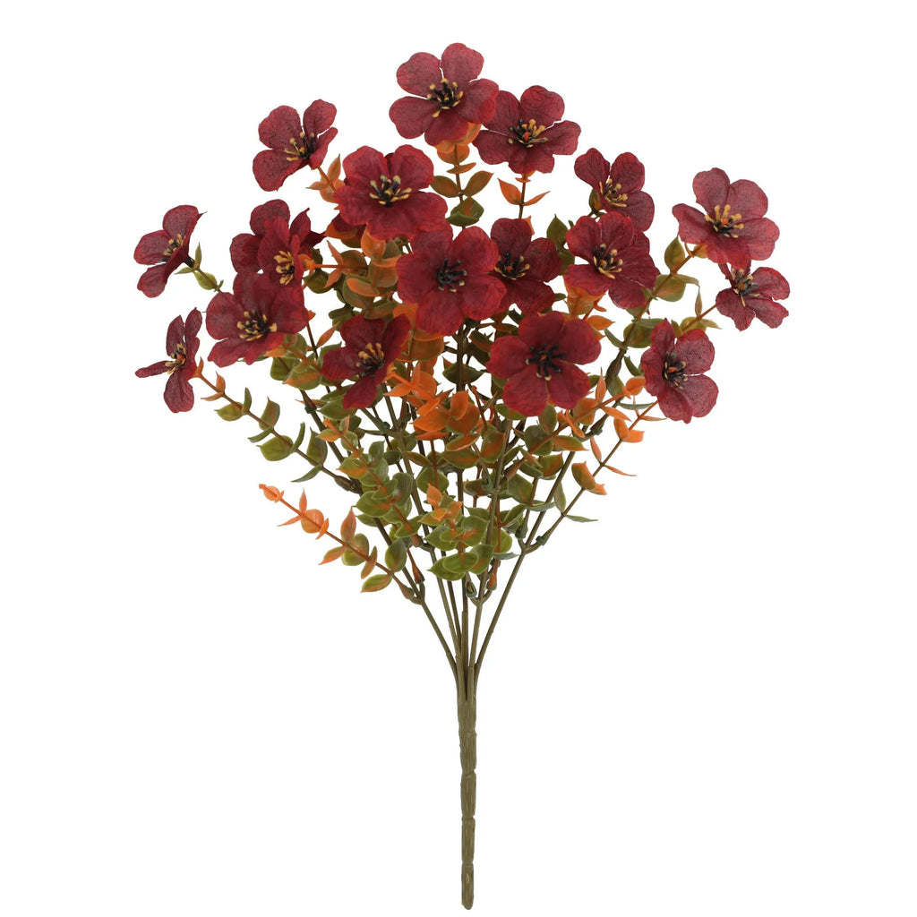Artificial flower bouquet in autumn red, yellow, orange and orange-yellow colours for home and wedding decoration