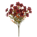 Artificial flower bouquet in autumn red, yellow, orange and orange-yellow colours for home and wedding decoration