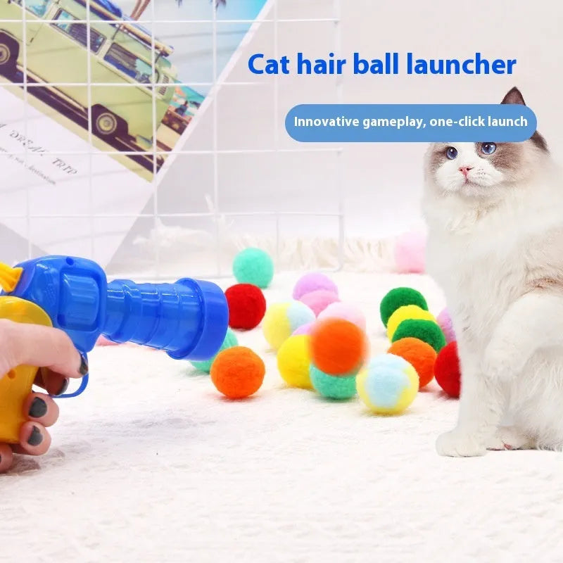 Plush pet launch gun with soft yarn balls for interactive cat and dog play sessions